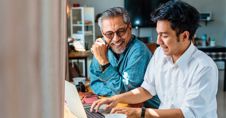 father and adult son at laptop in home gettyimages 1186050905 1200w 628h