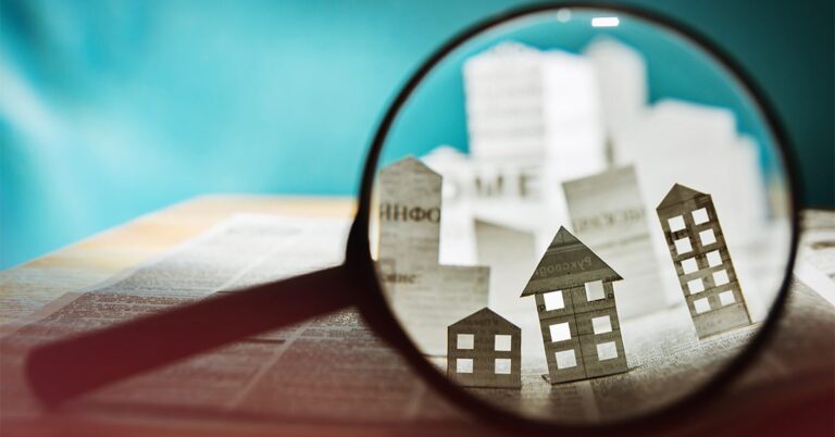 magnifying glass and newspaper houses GettyImages 827615404 1200w 628h
