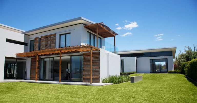 modern house big lawn GettyImages 147205642 1200w 628h
