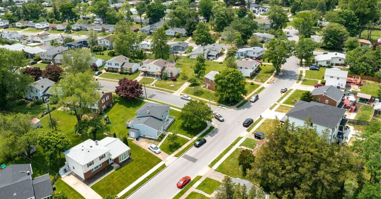 low aerial shot of suburban neighborhood gettyimages 1492700701 1200w 628h