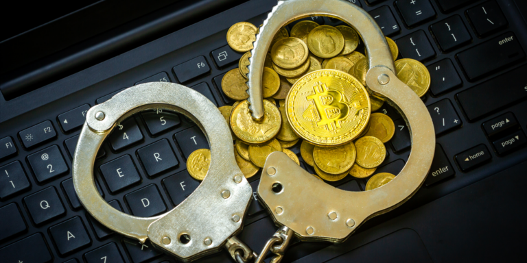 bitcoin handcuffs shutterstock gID 7